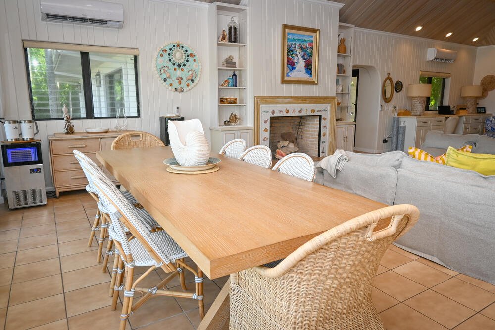 Dining table with rattan chairs