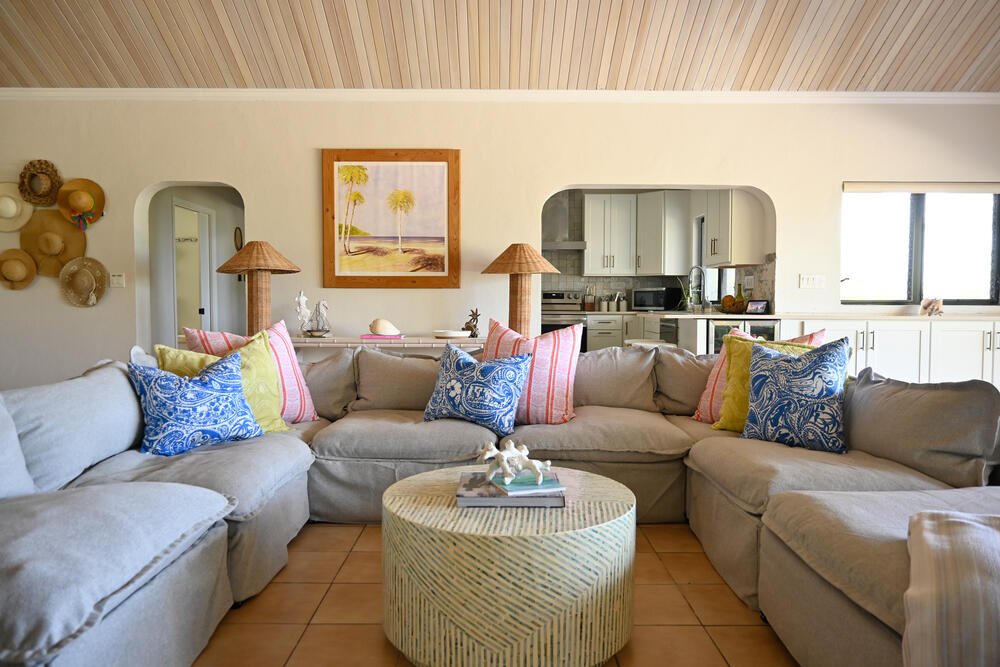 Sectional sofa with colorful pillows