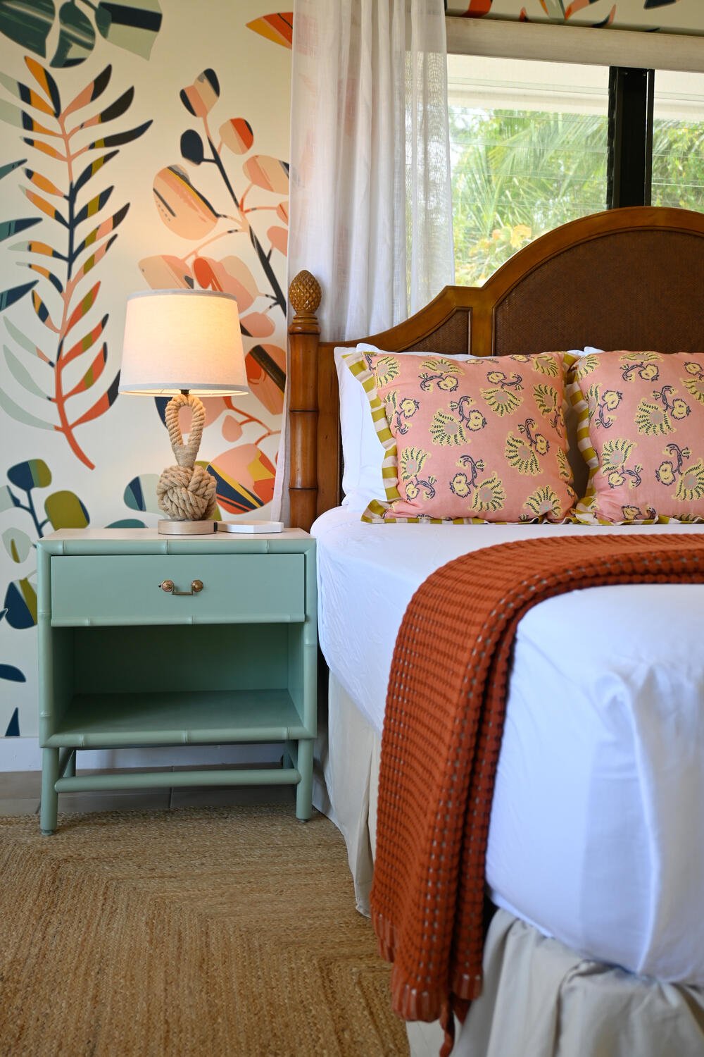 Bedside detail with botanical wallpaper